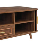Table basse multi-rangements avec portes coulissantes et tiroir