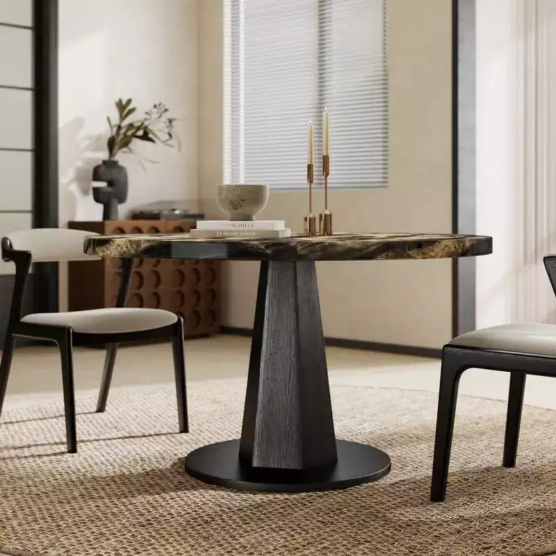 Table à manger moderne aspect marbre avec piètement central en bois