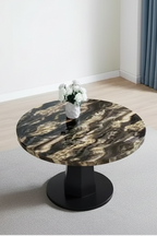 Table à manger moderne aspect marbre avec piètement central en bois