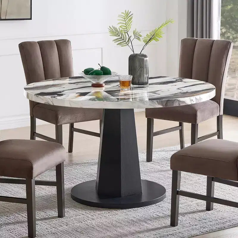 Table à manger moderne aspect marbre avec piètement central en bois
